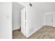 Hallway featuring new floors and neutral walls that create a clean, inviting transition between rooms at 1866 Matterhorn Dr, Orlando, FL 32818