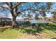 Lake access featuring a dock, gazebo, and benches for relaxing by the water at 2913 Carmia Dr, Orlando, FL 32806