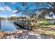 Dock with gazebo offering serene lake views and access for waterfront enjoyment at 2913 Carmia Dr, Orlando, FL 32806