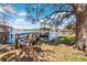 Lake access offers a dock with gazebo, perfect for enjoying waterfront views and recreation at 2913 Carmia Dr, Orlando, FL 32806