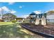 Community playground offers slides, open space, and a picnic shelter for Gathering fun at 2913 Carmia Dr, Orlando, FL 32806