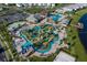 Aerial view of community clubhouse, pool, lazy river, and various community amenities at 2945 Simile St, Kissimmee, FL 34746