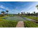 Outdoor community basketball court surrounded by manicured green lawns at 2945 Simile St, Kissimmee, FL 34746
