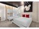 Unique themed bedroom showcasing custom wallpaper, a bunk bed, a queen bed, and a distinctive Mickey Mouse wall decoration at 2945 Simile St, Kissimmee, FL 34746