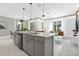 Spacious kitchen boasts a large island, modern appliances, and an open layout at 2945 Simile St, Kissimmee, FL 34746