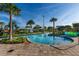 Community lazy river with tropical landscaping and clear blue water at 2945 Simile St, Kissimmee, FL 34746