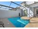 Private pool with a screened enclosure, and a patio area at 2945 Simile St, Kissimmee, FL 34746