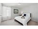 Bright and airy bedroom featuring a sunny window, plush carpet, and neutral decor at 3270 Mt Vernon Way, Kissimmee, FL 34741