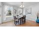 Dining room with natural light, tile floors and decorative light fixture at 3270 Mt Vernon Way, Kissimmee, FL 34741