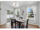 Dining room with natural light, tile floors and access to the backyard at 3270 Mt Vernon Way, Kissimmee, FL 34741