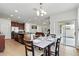 Open dining room area flows into the kitchen and features tile floors at 3270 Mt Vernon Way, Kissimmee, FL 34741