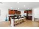 Spacious kitchen featuring a large island with seating and stainless steel appliances at 3270 Mt Vernon Way, Kissimmee, FL 34741