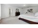 Spacious main bedroom featuring a large bed, neutral decor, and a serene ambiance at 3270 Mt Vernon Way, Kissimmee, FL 34741