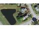 The aerial view shows property lines, a pond, and a home's location in relation to neighboring houses and streets at 3304 Kelsey Ln, St Cloud, FL 34772
