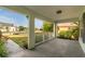 Inviting front porch with white railings and ample space for outdoor seating, offering views of the neighborhood at 3304 Kelsey Ln, St Cloud, FL 34772