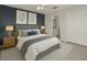 Comfortable main bedroom featuring decor, an ensuite bathroom, and a closet at 3304 Kelsey Ln, St Cloud, FL 34772