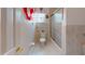 Bright bathroom with shower and toilet, uniquely decorated with a candy theme at 3520 Arch St, Orlando, FL 32808
