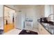 Functional kitchen featuring a white refrigerator, stove, and tile flooring at 3520 Arch St, Orlando, FL 32808