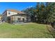 Large backyard with private screened-in pool at 390 Miro Dr, Davenport, FL 33837