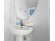 Bathroom with modern sink, round mirror and soap, offering essential amenities at 390 Miro Dr, Davenport, FL 33837