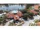 Aerial view of the clubhouse with an inviting entrance and circular drive at 390 Miro Dr, Davenport, FL 33837