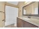 Bathroom featuring a vanity with marble countertop and shower with curtain rod at 477 Bohannon Blvd, Orlando, FL 32824