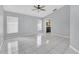 Spacious bedroom with tile flooring and large window for ample natural light at 477 Bohannon Blvd, Orlando, FL 32824