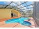 Backyard enclosed pool with a fountain and easy access to the home at 477 Bohannon Blvd, Orlando, FL 32824