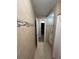 Tiled bathroom featuring a granite vanity, mosaic tile detail, and a neutral color palette at 48 E Par St, Orlando, FL 32804