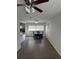 Bright dining room featuring hardwood floors and a contemporary ceiling fan at 48 E Par St, Orlando, FL 32804