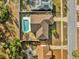 A top-down view of the home's layout, backyard pool, and surrounding neighborhood at 4804 Beacon St, Orlando, FL 32808