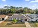 Charming single-story home with well-maintained landscaping, and a paved driveway at 4804 Beacon St, Orlando, FL 32808