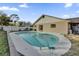 Backyard pool featuring a sun-soaked patio, and easy access to the home's sliding glass door at 4804 Beacon St, Orlando, FL 32808