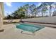 A refreshing backyard pool with a concrete deck, ready for relaxation and summer fun at 4804 Beacon St, Orlando, FL 32808