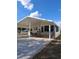 This home has a covered carport and a screened in front porch at 50989 Highway 27 # 105, Davenport, FL 33897