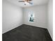 Bright bedroom with a ceiling fan and a window that provides natural light at 5323 Rochester Pl, St Cloud, FL 34771
