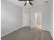 Comfortable bedroom with carpet, ceiling fan, and closet for storage at 5323 Rochester Pl, St Cloud, FL 34771