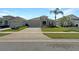 Charming single Gathering home with a well-manicured lawn and a two-car garage at 5323 Rochester Pl, St Cloud, FL 34771