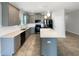 Modern kitchen with stainless appliances, granite countertops, and ample cabinet space at 5323 Rochester Pl, St Cloud, FL 34771