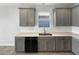 Stylish kitchen features stainless steel appliances, quartz countertops, and under-mount sink at 5323 Rochester Pl, St Cloud, FL 34771
