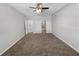 Spacious carpeted bedroom with a private en-suite bathroom and walk in closets at 5323 Rochester Pl, St Cloud, FL 34771