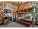 Themed bedroom with custom bunk beds, unique decor, and accent lighting at 537 Marcello Blvd, Kissimmee, FL 34746