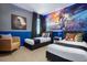 This themed bedroom features twin beds, Star Wars wall art, and blue accent lighting at 537 Marcello Blvd, Kissimmee, FL 34746