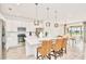 Modern kitchen with stainless steel appliances and an island with bar seating at 537 Marcello Blvd, Kissimmee, FL 34746