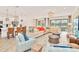 Bright living area flows into the kitchen and dining space, with a view of the lake at 537 Marcello Blvd, Kissimmee, FL 34746