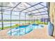 Gorgeous pool with a hot tub and lake view, perfect for relaxation and entertaining at 537 Marcello Blvd, Kissimmee, FL 34746