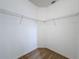 Empty walk-in closet with metal shelving at 603 Deauville Ct, Kissimmee, FL 34758