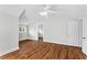 Bright bedroom with hardwood floors and natural light throughout at 627 N Hyer Ave, Orlando, FL 32803