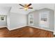 Bedroom featuring hardwood floors, natural light, and a ceiling fan at 627 N Hyer Ave, Orlando, FL 32803