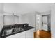 Kitchen area with sink, white cabinetry and dishwasher at 627 N Hyer Ave, Orlando, FL 32803